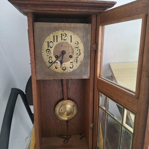 Wooden Radium wall clock used with vintage pendulum