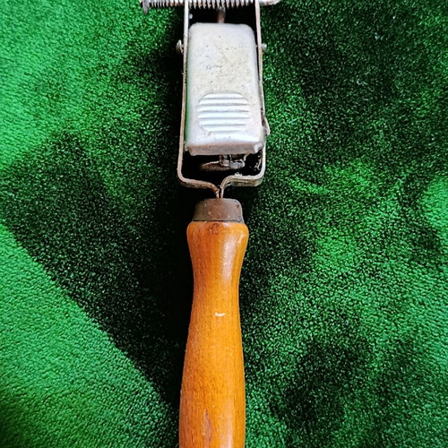 Vintage mechanical flint gas lighter with wooden handle