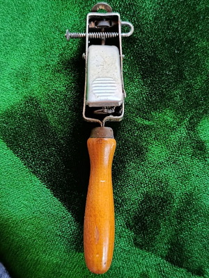 Vintage mechanical flint gas lighter with wooden handle