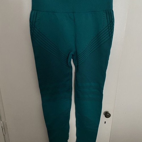 Turquoise leggings, new