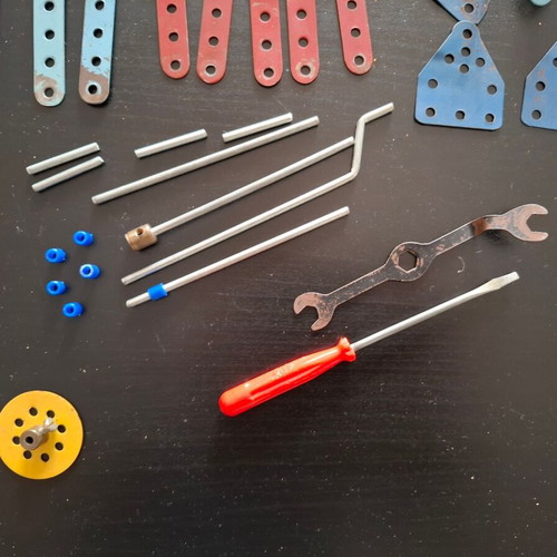 Metal construction toy used with wear