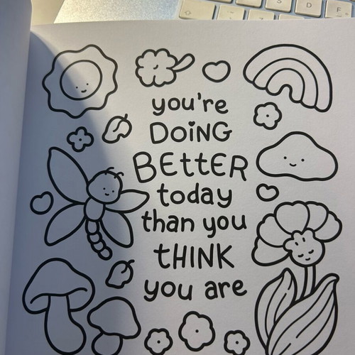 Cozy Vibes colouring book with 45 handwritten pages