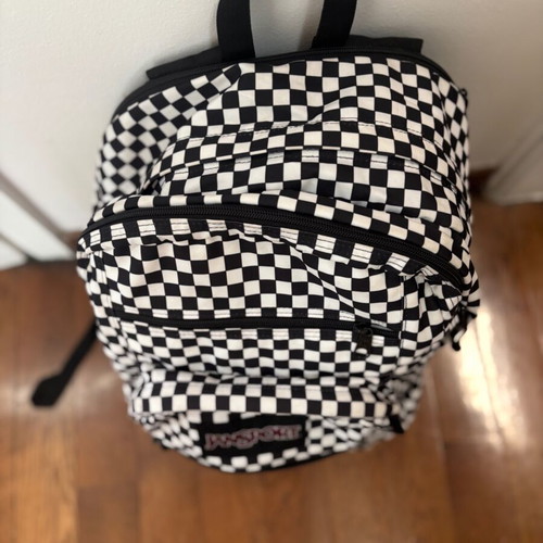 Jansport black and white checkerboard backpack with laptop compartment