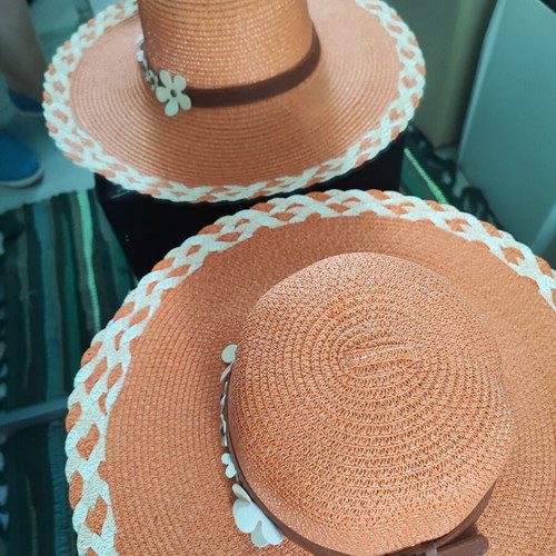 Beach hat like new, orange with flower decoration