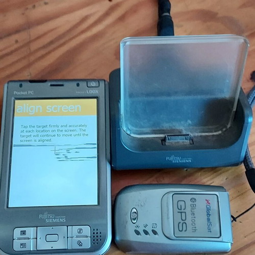 Fujitsu Siemens Pocket LOOX 720 PDA used with GPS tracker and accessories