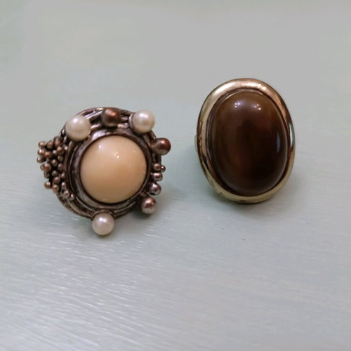 Two rings used, medium size, with metal discoloration