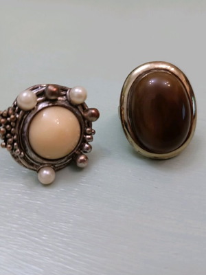 Two rings used, medium size, with metal discoloration