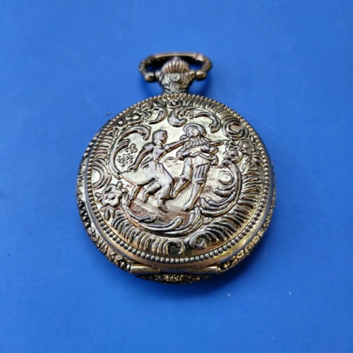 Pocket watch new in gold color with battery