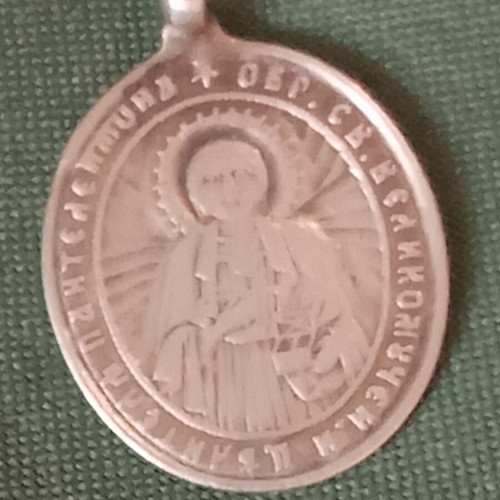 Silver medallion like new, antique with Saint Panteleimon and Virgin Mary