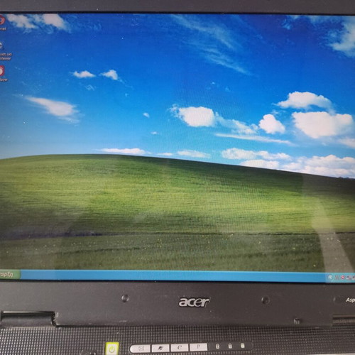 Acer Aspire 5024 laptop used with power adapter and Windows XP