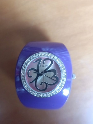Niko watch used, purple and silver, needs new battery, small wrist