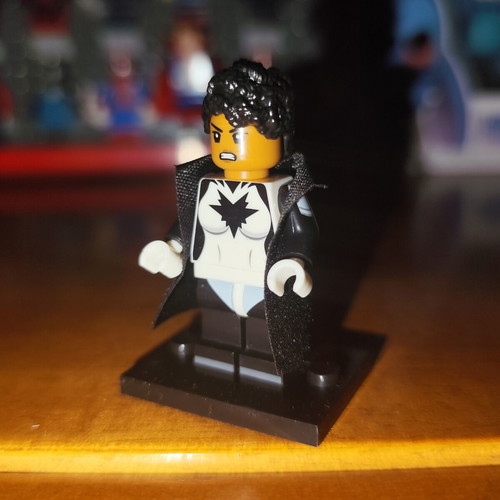 Spectrum Monica Rambeau minifigure like new with stand and black coat