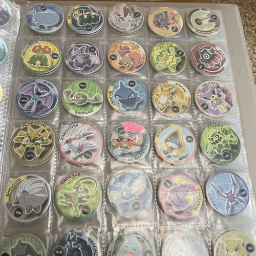 Pokemon tazos with album collection
