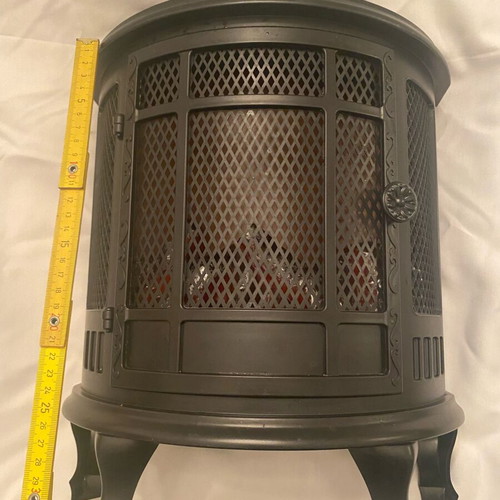 Decorative fireplace insert used with flame motion effect