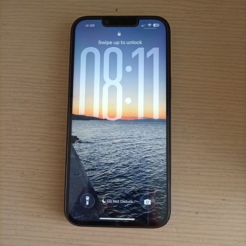iPhone 14 Midnight Blue with case and screen protector
