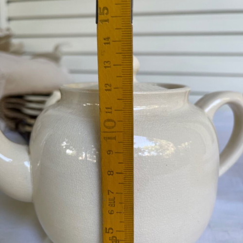 Price Bros tea set used, includes teapot, sugar bowl and two jugs