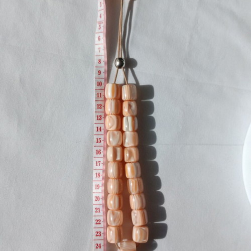 Komboloi with peach-orange cubic beads like new