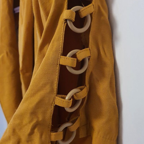 Mustard jacket like new with V front closure and sleeve rings
