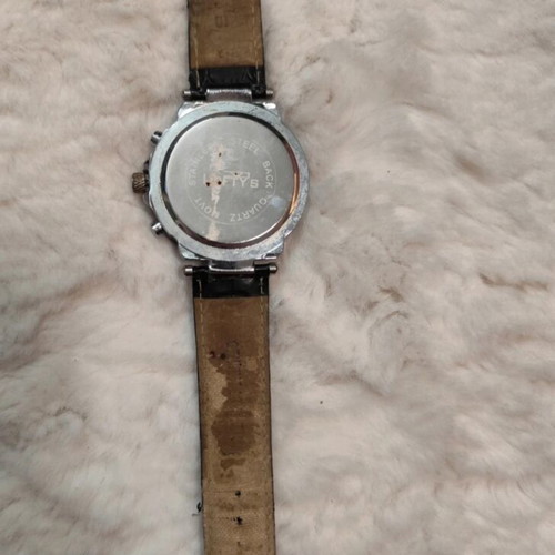 Lofty's men's watch used with worn strap and scratches