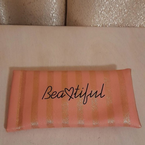 Beautiful glasses case new, pink with gold stripes