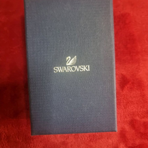 Swarovski necklace like new, gold color