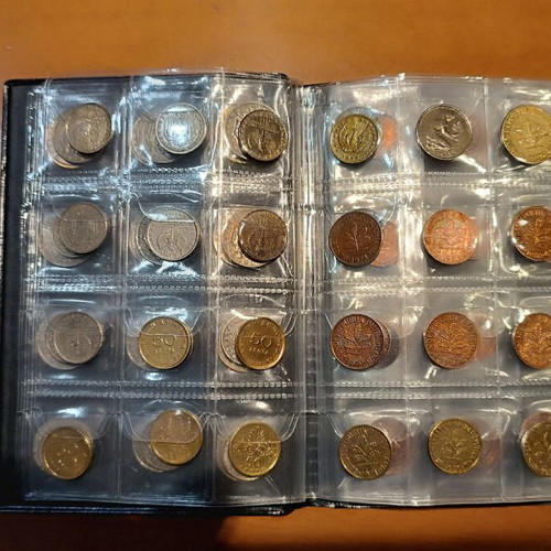 Album of 120 collectible coins from 7 countries