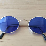 Oval sunglasses new with blue lenses and golden frames