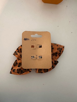 Leopard hair bow like new with rhinestones