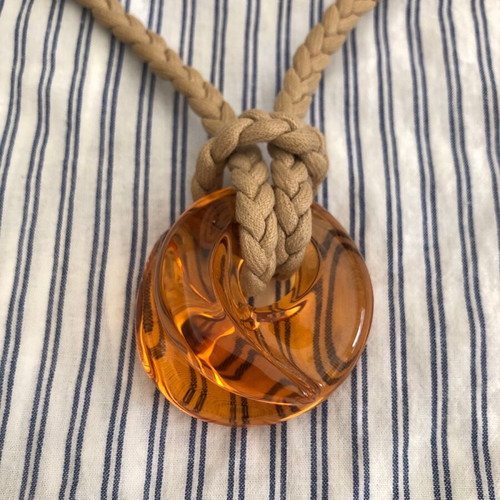 Baccarat crystal pendant like new, amber color