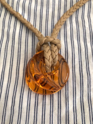 Baccarat crystal pendant like new, amber color