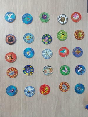 Pokemon Tazos pack of 47 and 5 gold plates like new