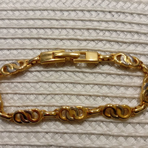 Classic Style Bracelet new with elegant gold and silver weave