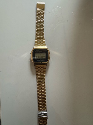 Casio digital watch used, gold color