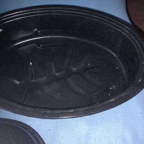 Small new black roasting pan