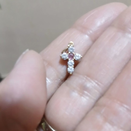 Gold cross 14K used with 5 zircon stones and 1 central ruby