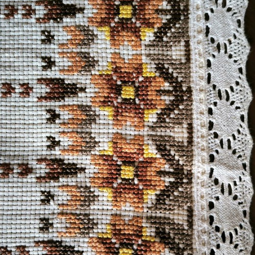 Handmade embroidered table runner with Cretan stitch and lace