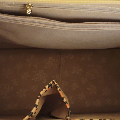 Leopard print women's handbag with strap