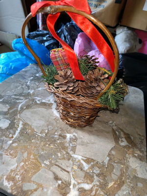 Decorated basket with pine cones new, Christmas
