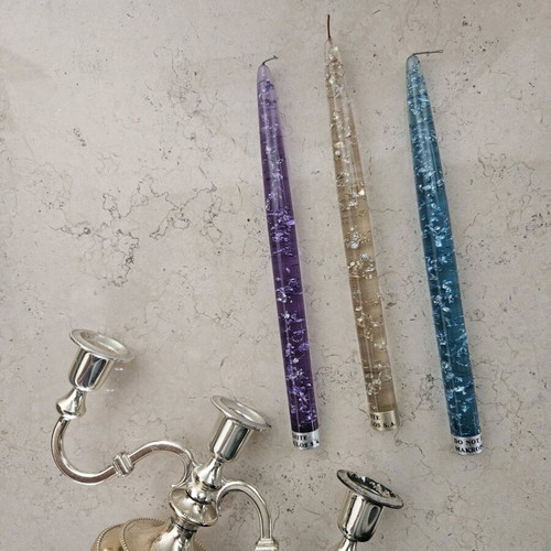 Candlestick with 3 used decorative plastic candles