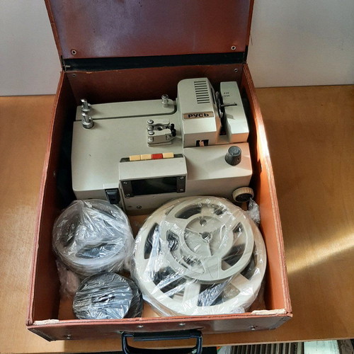 Russian projector used with leather case and film