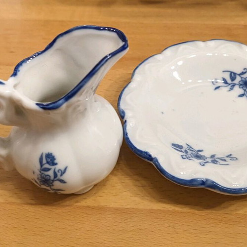 Porcelain jug with saucer like new