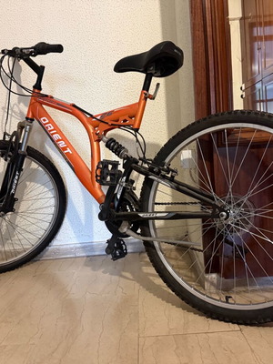 Orient Comfort Suspension mountain bike 26" used, orange, 18 speeds