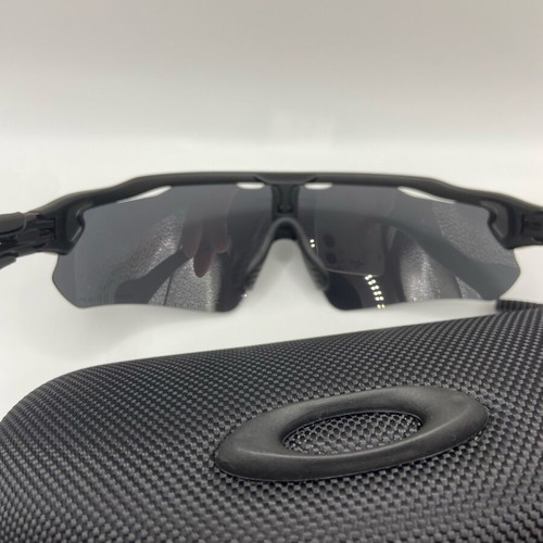 Oakley Sunglasses new with tags, black and silver