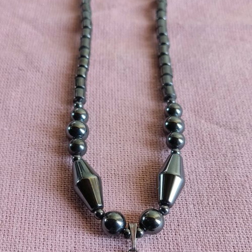 Hematite necklace like new with dolphin pendant