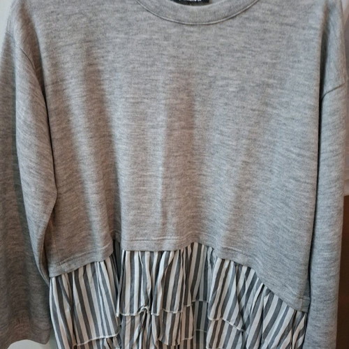 Long-sleeve blouse with ruffle hem gray new