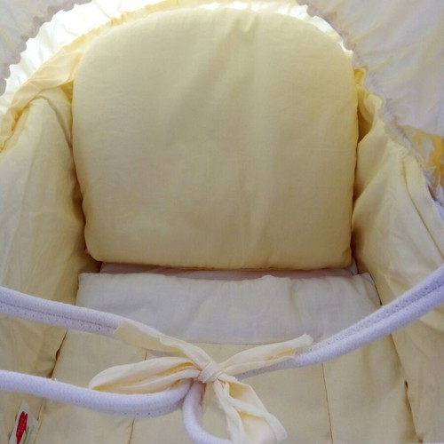 Motherbaby yellow bassinet like new with accessories and anatomical mattress
