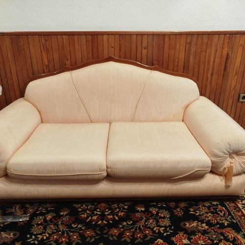 Two-seater sofa used, pink confetti color, heavy materials
