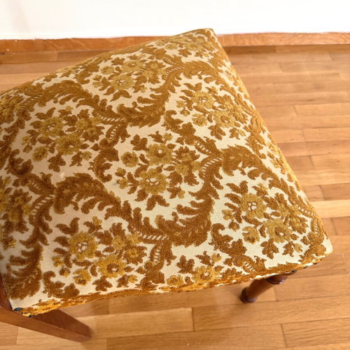 Chair used with wooden frame and brown velour fabric with floral pattern