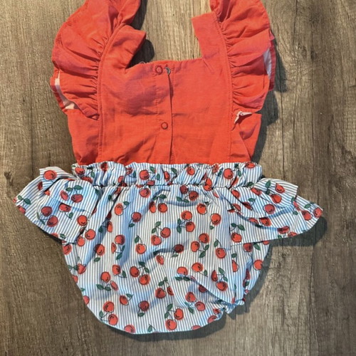 Baby romper like new with ruffles and cherry print, size 1-3 months