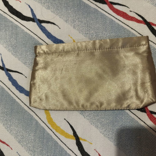 Helena Rubinstein gold clutch bag like new